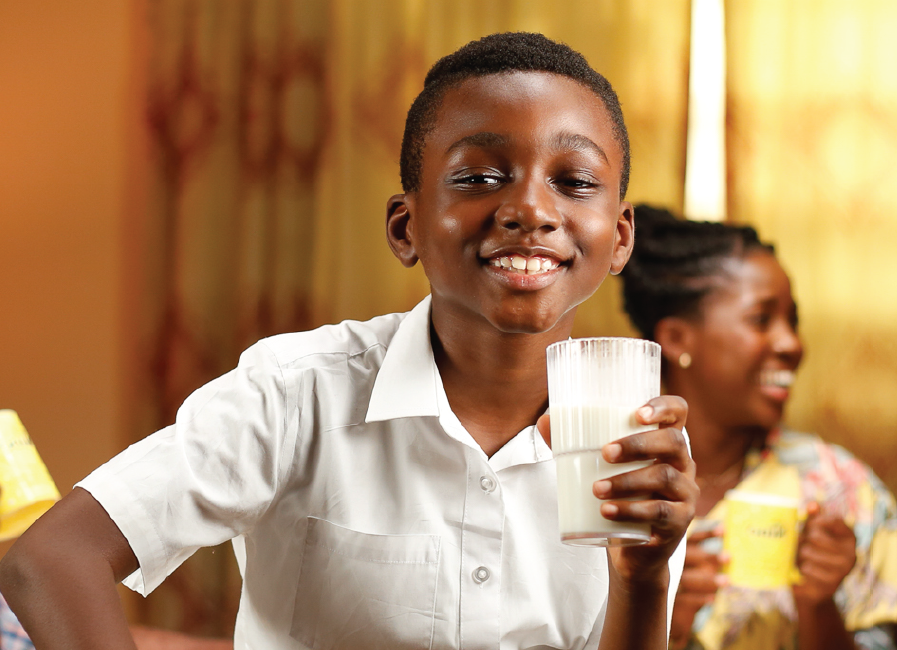 Happy Child Drinking NIDO